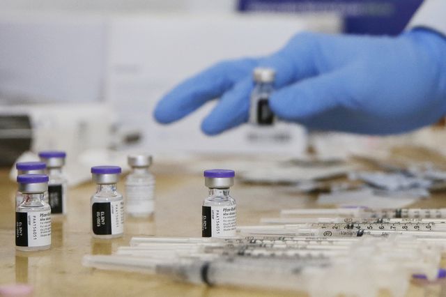 Syringes are filled with COVID-19 vaccine when they are prepared for outpatients to receive the dose before Secretary of State Rossana Rosado and New York State open another New York State vaccination site at Corsi Houses in East Harlem on January 15th.